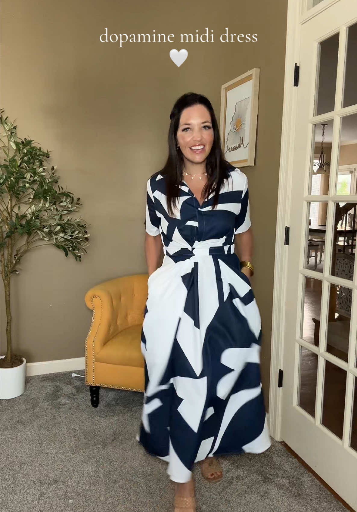 The navy and white print dress is great for work, dinner out and church. Such a high quality dress from @UOOZEE US #mididress #dress #dopaminedressing #statementdress 