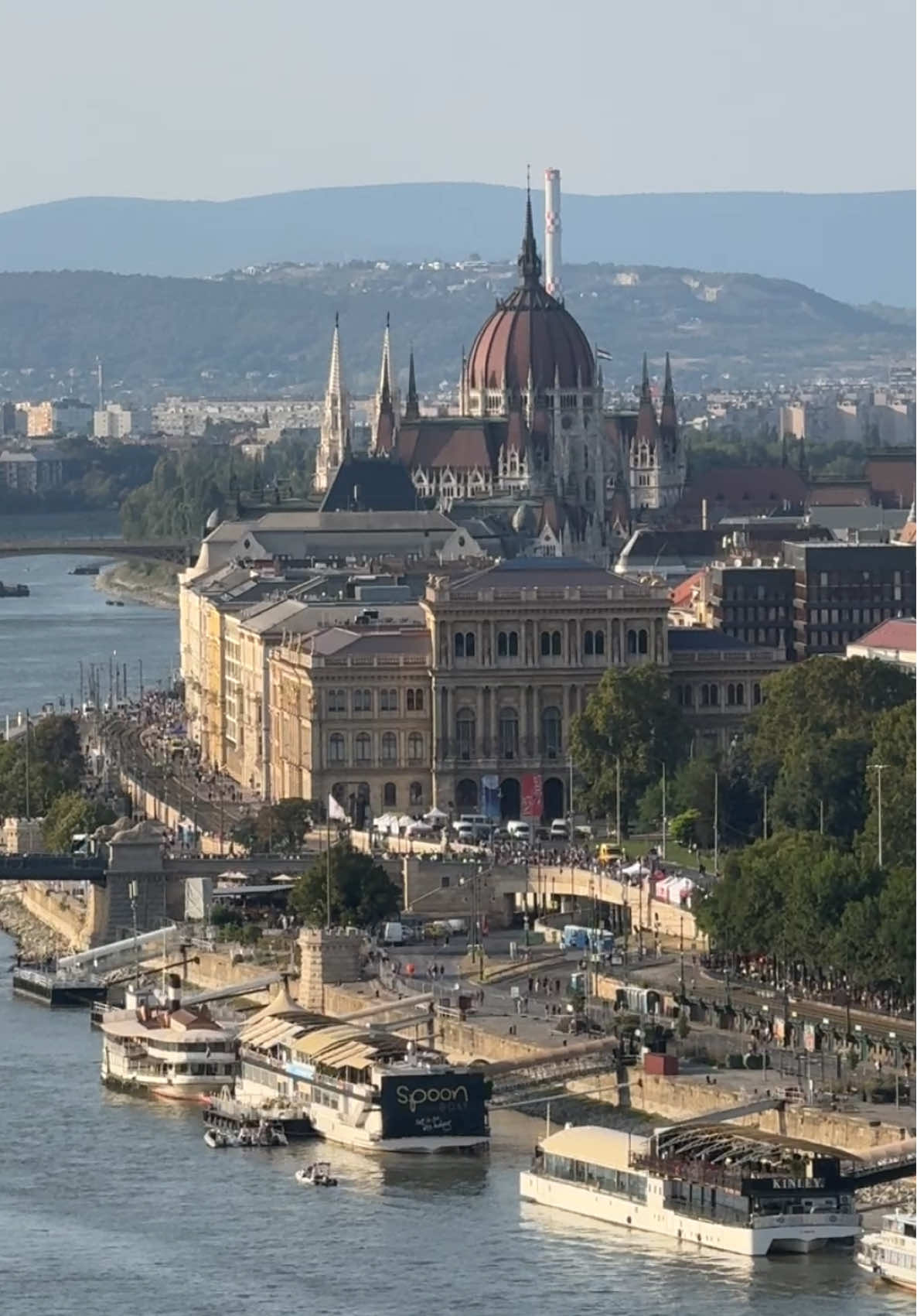 Perched above the city, Gellért Hill offers one of the most iconic perspectives of Budapest, making it a must see for anyone exploring Hungary’s capital.🌿❤️ From this vantage point you can take in the sweeping panorama of the Danube River as it winds through the city, with the graceful arches of the Elizabeth Bridge and other majestic bridges connecting Buda and Pest. 🌁😍 The Hungarian Parliament Building stands proudly on the riverbank, its grand neo Gothic architecture gleaming in the daylight, while the dome of St Stephen’s Basilica rises elegantly above the skyline.🏛️❤️🇭🇺 Down below, Budapest’s famous trams glide along the waterfront, adding movement and charm to the cityscape.😍🚋 A visit to Gellért Hill is one of the top Budapest things to do, especially if you are searching for free things to do in Budapest that truly capture the spirit of the city.🙌🏽 The views here reveal both the grandeur and the intimacy of Budapest, from monumental landmarks to everyday scenes along the river. Whether you are planning your trip with a Budapest guide or simply looking for Budapest tips, Gellért Hill is a highlight not to be missed, offering a perfect daytime glimpse into the beauty and rhythm of Hungary’s capital.🌿❤️ @Budapest, Hungary  #budapest #budapesthungary #budapesttravel #budapestguide #budapesttips 