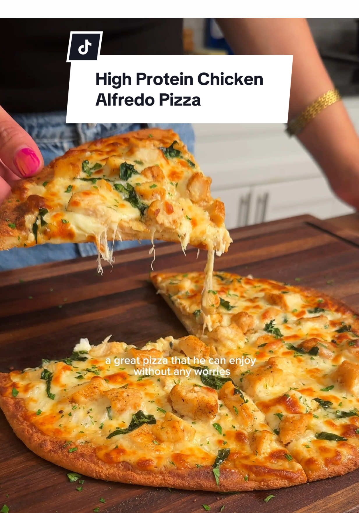 🍕High Protein Chicken Alfredo Pizza Ingredients: For the Pizza Dough: 1 cup cottage cheese 1 1/2 cups almond flour 1/2 cup parmesan cheese 1/8 tsp xanthan gum 1/8 tsp salt 1/8 tsp oregano 1/8 tsp garlic powder 1 large egg For the Alfredo Sauce: 2/3 cup heavy cream 3 tbsp unsalted butter 1/4 cup parmesan cheese 1/4 tsp thyme 1/2 tsp salt Toppings: Mozzarella cheese, grated Chicken breasts, chopped Parsley, chopped Fresh chopped spinach Chopped onion Instructions: 1. Start by blending the egg and cottage cheese until smooth. 2. In a bowl, combine all the other pizza dough ingredients and mix with the blended egg and cottage cheese until well incorporated. This will form a soft and sticky dough. Let it rest in the refrigerator to make it easier to handle. 3. Meanwhile, prepare the Alfredo sauce. In a high-sided skillet, heat avocado oil and sauté chopped chicken breast until cooked through. Remove the chicken and set aside. 4. Reduce the heat and add butter to the skillet. Deglaze the pan to incorporate the chicken flavors. 5. Add heavy cream, parmesan cheese, thyme, and salt. Stir constantly to prevent sticking and to form a smooth cream without lumps. You'll get a rich, thick sauce. 6. On a baking sheet lined with parchment paper, flatten the pizza dough into a circular shape, resembling a classic pizza. 7. Bake at 400F for 20-25 minutes, or until lightly golden. 8. Spread a generous amount of Alfredo sauce over the baked crust. Top with mozzarella cheese, chopped red onion, chopped chicken, and a little chopped spinach. 9. Bake for another 15 minutes, or until the cheese is bubbly and toasted. Finish by broiling for 2 minutes for extra crispiness. 12. Garnish with fresh chopped parsley. Enjoy your delicious, high-protein, low-carb pizza! 🍕