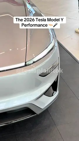 The 2026 Tesla Model Y Performance at Tesla’s Showroom in Düsseldorf, Germany 🇩🇪.  Here’s what’s new:  — Specs — ✅ 580 km / 360 mi WLTP range [+66 km / +41 mi] ✅ 0–100 km/h in 3.5s / 0-60mph in 3.3s ✅ 250 km/h / 155 mph max speed ✅ New Performance Powertrain ✅ Adaptive Suspension and Unique Drive Modes — Exterior — ✅ Sporty front bumper ✅ Sporty rear bumper ✅ New 21” Archnid 2.0 wheels ✅ Pirelli P-Zero tires ✅ Carbon fiber rear spoiler ✅ Performance badge ✅ Red brake calipers — Interior — ✅ First-Row Performance Sport Seats With Thigh Extension, Heating and Ventilation (and insert) ✅ Carbon fiber interior trim ✅ 16” QHD touchscreen ✅ Grey headliner ✅ Starting at €61,990 / £61,990 ✅ Deliveries begin in September #tesla #modelyperformance #myp #modelyjuniper #teslaplaidtok 