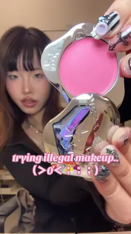 trying ILLEGAL makeup from @mezybeauty ... 😢🚓 it's not actually dangerous, just their brand concept!! 👅 plz support the girls & this amazing indie brand, i'm so impressed by their products <3  🍇 CREAM LUSH: 5/5 2 shades, 'ZAI' is a cool baby pink and 'BRUISED' is a cool & deep raspberry pink.  the pigmentation is absolutely crazy, you only need a bit for amazing payoff!! amazing blending w a brush and the PACKAGING??? 100% metal. it feels as premium as it looks. only downside is how heavy it is but its so pigmented idt you'll need any on-the-go touchups. amazying 💋 💄 LIP FUSION: 3.6/5 four shades total, i received 'BRUISED', a mauvey red and 'ZAI', a bright pink.  colours are very sheer but compliment the lips very well! the formula is a mix between lip oil and gloss. very moisturising and non-sticky, has a lovely cotton candy fragrance but i can see this being trouble for those sensitive to fragrance. packaging feels cheap in comparison to blush, but the formula makes up for it! 🩶 thank you to the girls for this PR 🩶 #fyp #mezybeauty #makeup #makeupunboxing #makeupswatches #creamblush #blushtrend #blusher #pinkblush #redblush #lipgloss #lipoil #lipglossswatch #indiebeauty #makeupfinds #boldmakeup #chic #sephora #trendingmakeup #edgymakeup #cosmetics #makeuplover #swatchingmakeup #messygirl #foryou #trending #xybca 