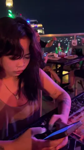 Drinking at the bar with my girlfriend.