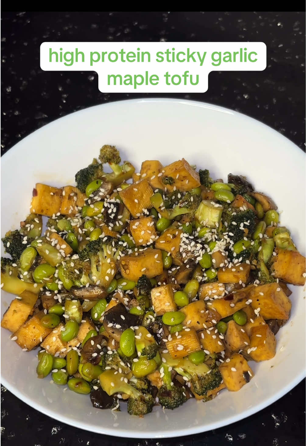 high protein vegetarian meals can be so delicious and easy to make with this sticky garlic maple tofu recipe. the edamame beans pack in extra protein & adds to the crunchy & chewy texture of the dish and what’s even better is that it tastes great fresh or meal-prepped #creatorsearchinsights #tofu #easymeals #veganrecipes #plantbased #highprotein #mealprep 