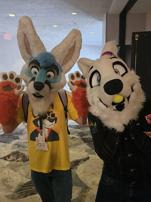 This photo is of me and my friend Bloosh at IFC2025 #furryfandom #ifc2025 #fursuiter #furry #homosexualfurry 