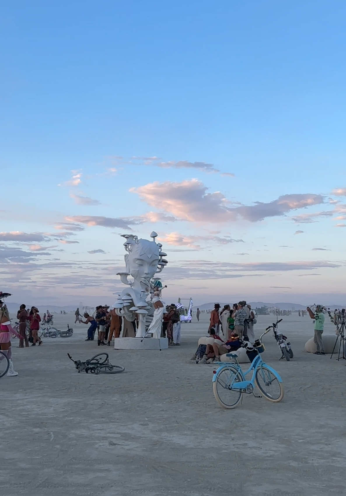 Sunset in Black Rock City casts its golden light across the playa, touching those who wander, climb, dance, or simply sit with their campmates in stillness. Tonight the Man burns, a reminder of all you’ve endured and created through a challenging week. Burning Man is not a festival — it is a global cultural movement that brings people together to connect and create in so many imaginative ways. Weather shifts, unpredictability rises, yet this community thrives because of you. It isn’t built or returned to dust by spectators, but strengthened through Communal Effort and Participation, each citizen shaping its spirit together. Art piece 1: “Guma” by Harper Clark Art piece 2: “Mycelia” by Daniel Popper Art piece 3: “Out the Other” by Kate Greenberg Man Pavilion designed by Mark Rivera (Kidnetick) #burningman #blackrockcity #burningman2025 #brc #thankslarry 