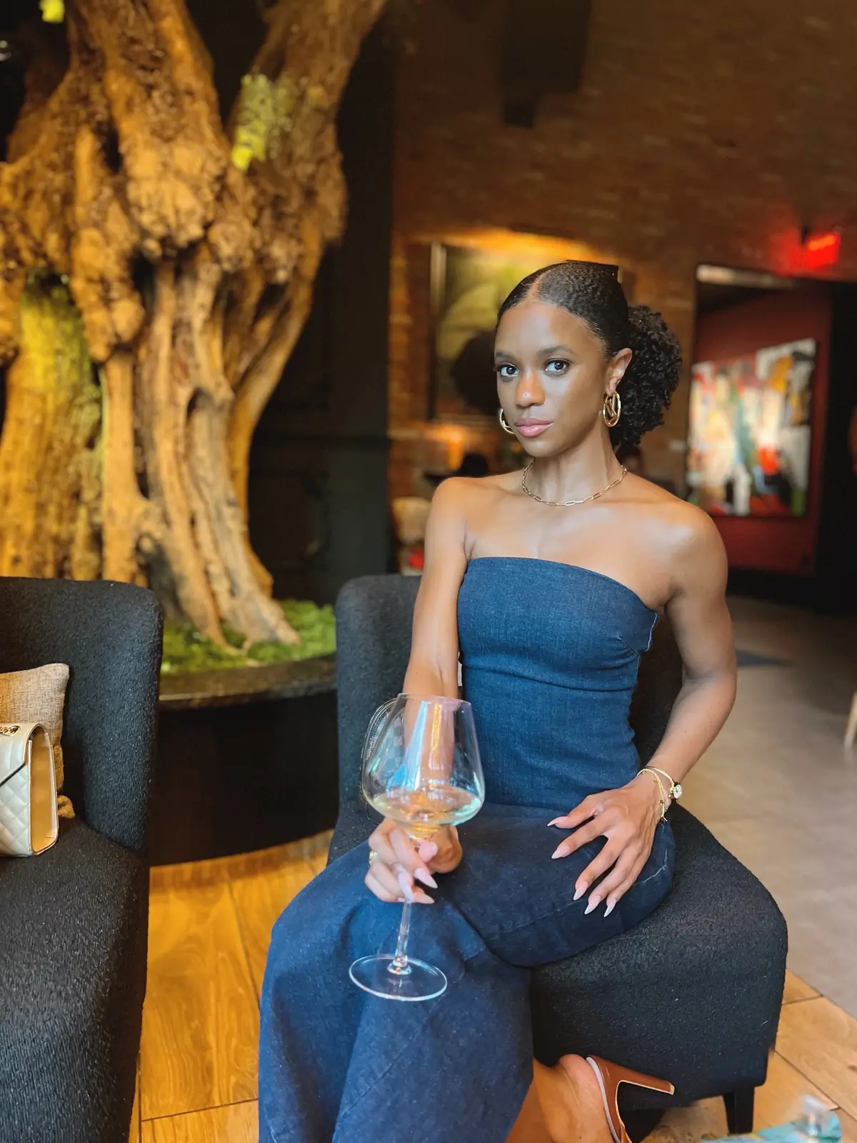 The wine isn’t the only thing aging fine 😉🍷✨ #FineWineVibes  #DenimAndChic  #SipInStyle  #GoldenGlow  #EffortlessElegance             