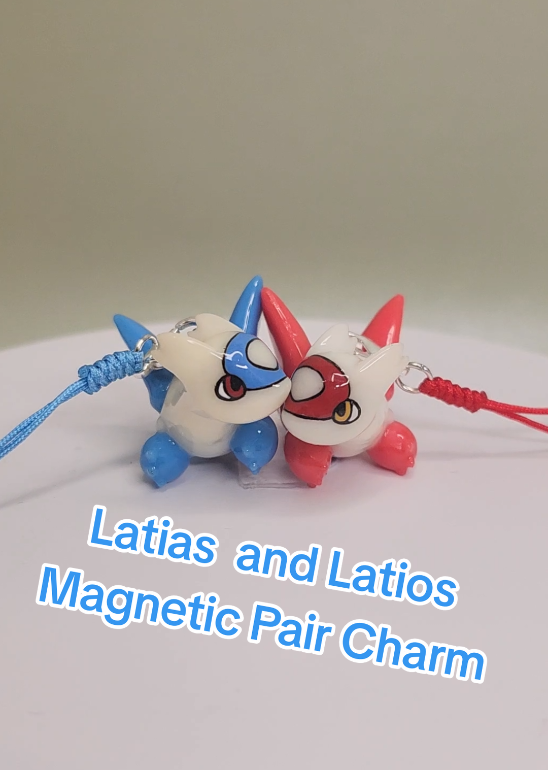Latias and Latios Pair Charm! these super cute charms have cleverly hidden magnets that make them stick together in an adorable way. #pokemon #resinart #handmade #latias #latios 