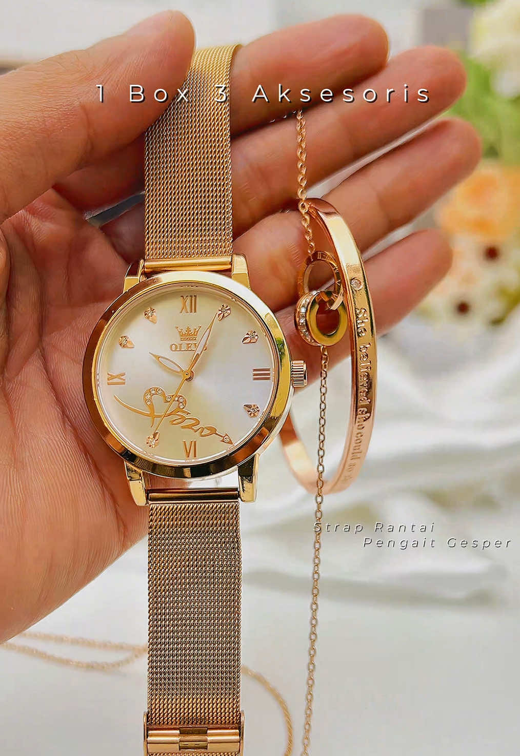 Jam set OLEVS dengan aksesoris lengkap modis dan elegan di pergelangan tangan wanita. #promoguncang99 #olevs #jamtanganwanita #jamtangan #kadopacar 