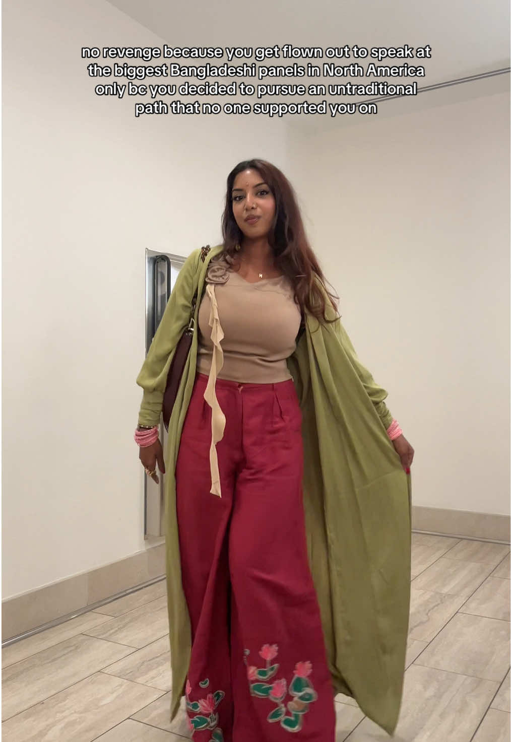 a Bangladeshi woman taking up the center stage wearing her own designs for the biggest Bangladeshi panel!! little mohuya is so happy :') so happy I got to meet some of you at Fobana Atlanta yesterday ❤️ top thrifted  cardigan @Veiled  trousers @labyrinthave  shoes alfani #bengali #businessowner #outfitinspo #southasiantiktok 