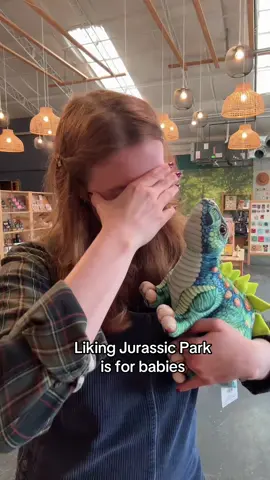 Guess we're just a bunch of big dumb (cute) babies then. 🤷‍♀️🫶 #giftshop #jurassicpark #okc #shoplocal #dinosaur 