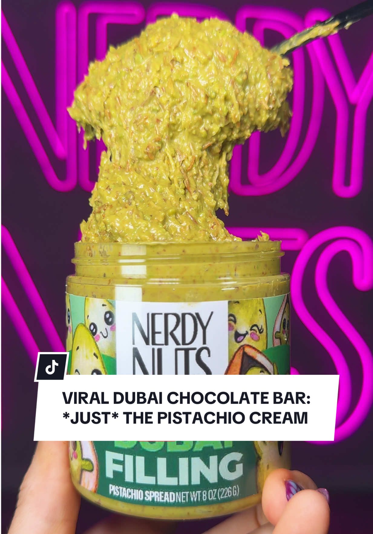 How many ways can you enjoy the Dubai Chocolate Bar JUST pistachio kataifi filling? The limit does not exist. Seriously, we have had countless requests for just a jar of the filling. We heard you. 8oz of pistachio kataifi cream is HERE!! 💚  The real question is - are you eating it on its own or pairing it with ur fave snackarooski? #dubai #dubaichocolate #nerdynuts #viral #customerservice 