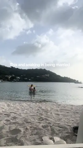 The way I am obsessed with this view at the beach! Being able to experience this all with my husband has been insane! #honeymoon #sandalsaintvincent #creatorsearchinsights #2025bride 