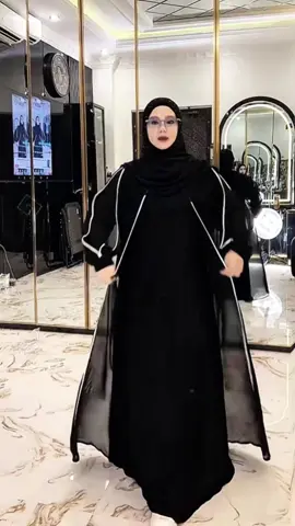 Aqila Abaya Dress tersedia size: S, M, L, XL, XXL. Bahan Saudi Jetblack mix Sifon Saudi mix Jersey  Premium. Busui friendly ada ritsleting aktif di bagian depan dan sudah wudhu friendly.  Aqila Abaya Dress merupakan salah satu produk terbaru dari Alkhatib Collection. Kali ini Alkhatib Collection memberikan desain yang unik pada Abaya Aqila ini, menggunakan perpaduan dua bahan dengan model layer yang cantik pada bagian depannya sehingga menyerupai outer, namun ini sudah terkahit menyatu. Pada bagian lengan menggunakan bahan kaos Premium yang stretch kemudian dilapisi bahan Sifon dengan model lengan Aladin yang cantik, selain itu ada variasi bisban yang memperjelas cutting-an Abaya Aqila ini. Abaya Aqila merupakan abaya simple elegan yang layak dimiliki. Anak muda hingga orang tua semua cocok memakainya, bisa dipakai untuk persiapan haji umroh, bisa untuk kajian, bisa untuk kondangan dan untuk acara santai pun tetap nyaman dipakainya. Stock tidak banyak, jika menghendaki silahkan boleh langsung di check out ya Bunda 🤗 #abaya #abayaaqila #aqilaabayadress #abayaterbaru #abayakekinian #abayadress #dressabaya #abayasimpleelegan #abayastyle #abayagirls #abayafashion #gamis #gamisaqila #gamiskekinian #gamismurah #gamiselegan #gamissimpleelegan #gamiscantik #cod #fashionmuslim #fashionmuslimah #masukberanda #geraisandangan 