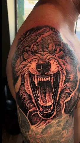 Shoulder wolf added on to the homies sleeve  DM me on Instagram for any booking info or questions! Thanks for the trust🙏 #shouldertattoo #wolftattoo #realismtattoo #blackandgreytattoo  #boise 