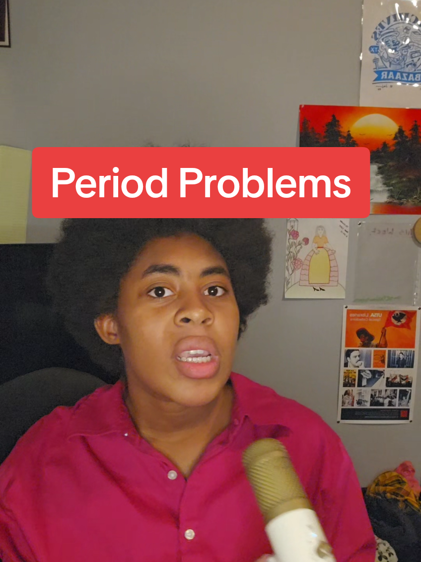 a not so quick run down on why I've been on some physical pain recently #doctors #periods #complain  video description: Me (A Black 20ish year old person) wearing a pink top talking into a microphone. I'm in a grey room with colorful posters behind me.