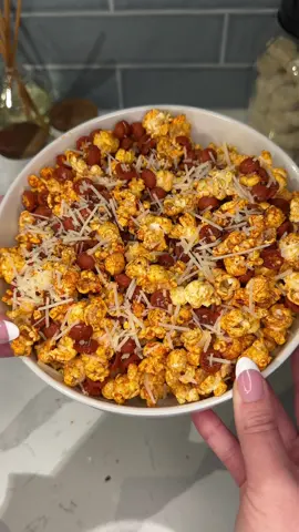 viral pepperoni pizza popcorn recipe 🍕🍿 Ingredients: 2 bags mini pepperoni pieces 1 bag @LesserEvil Snacks Himalayan pink salt popcorn 1 cup grated parmesan cheese 1/4 cup paprika 1 tbs oregano 2 tbs onion powder 2 tbs garlic powder 2-3 tbs shredded parmesan cheese crushed red pepper flakes Instructions: In a large pot, heat mini pepperoni for 4-5 minutes on medium-high heat. Remove pot from heat and pour in popcorn. Toss to mix. In a small mixing bowl, combine grated parmesan, paprika, oregano, garlic powder, and onion powder. Pour desired amount of seasoning over popcorn mixture and serve with shredded parmesan cheese and red pepper flakes on top.  Enjoy! 😋 #lesserevilyum #bestpopcorn #lesserevilyum #snack  #creatorsearchinsights 