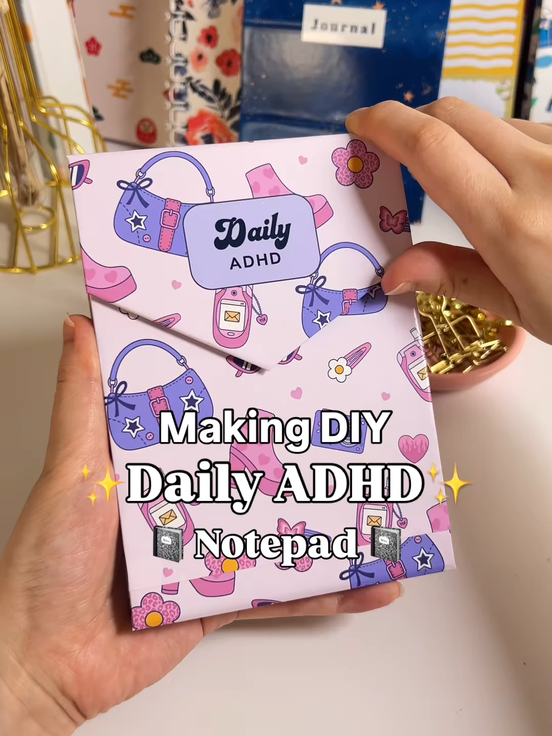 Making DIY Daily ADHD Notepad ✨💖🗒️ with magnetic closure 🧲 Materials: - Regular Paper - Magnet Sheet - Chipboard - White glossy sticker paper - PVA Glue Equipments: - Heavy Duty Paper cutter to cut paper Instructions: - Print out the inserts and cut to size. Total around 80 pages. - Clip the inserts and apply PVA glue to the top edge - Let it dry 15 min - Print the Cover Designs at 130% scale - Trim off the white edges if the cover designs - Connect the covers vertically. The cover design with the title “Daily ADHD” should be placed at the bottom - Prepare the following chipboards: Piece 1) 15 × 11 cm, Piece 2) 11 × 0.9 cm, Piece 3) 15 × 11 cm, Piece 4) 11 × 1 cm, Piece 5) 11 × 7.5 cm (one side 4.3 cm) - Remove the adhesive of the cover design and place down the chipboards with a 3.8mm gap between the pieces - Trim the corners - Fold in all the sides - Place white glossy sticker paper to the inside - Score the edges - Take the magnet sheet and cut out two squares - Make sure they line up on top of each other when placed together. - Place both magnets on the cover - Remove its adhesive and close the cover - Take the notepad and apply double sided tape to the back - Place the notepad on to the cover - You’re done! The template has been made and exported from Planify Pro. If you’re a seller interested in using the templates commercially, check out the business plan ✅ it comes with 500+ patterns, graphics, fonts, templates and more 💖 How to Export this Template from Planify Pro: Notepad: Go to Save/Export -> Selected Page -> Paper -> Select A4 -> Click Generate PDF Cover: Go to Save/Export -> Selected Page -> Paper -> Select A4 -> Click Generate PDF How to Print: Print inserts at 100% scale only front side. Print the cover at 130% scale at best quality