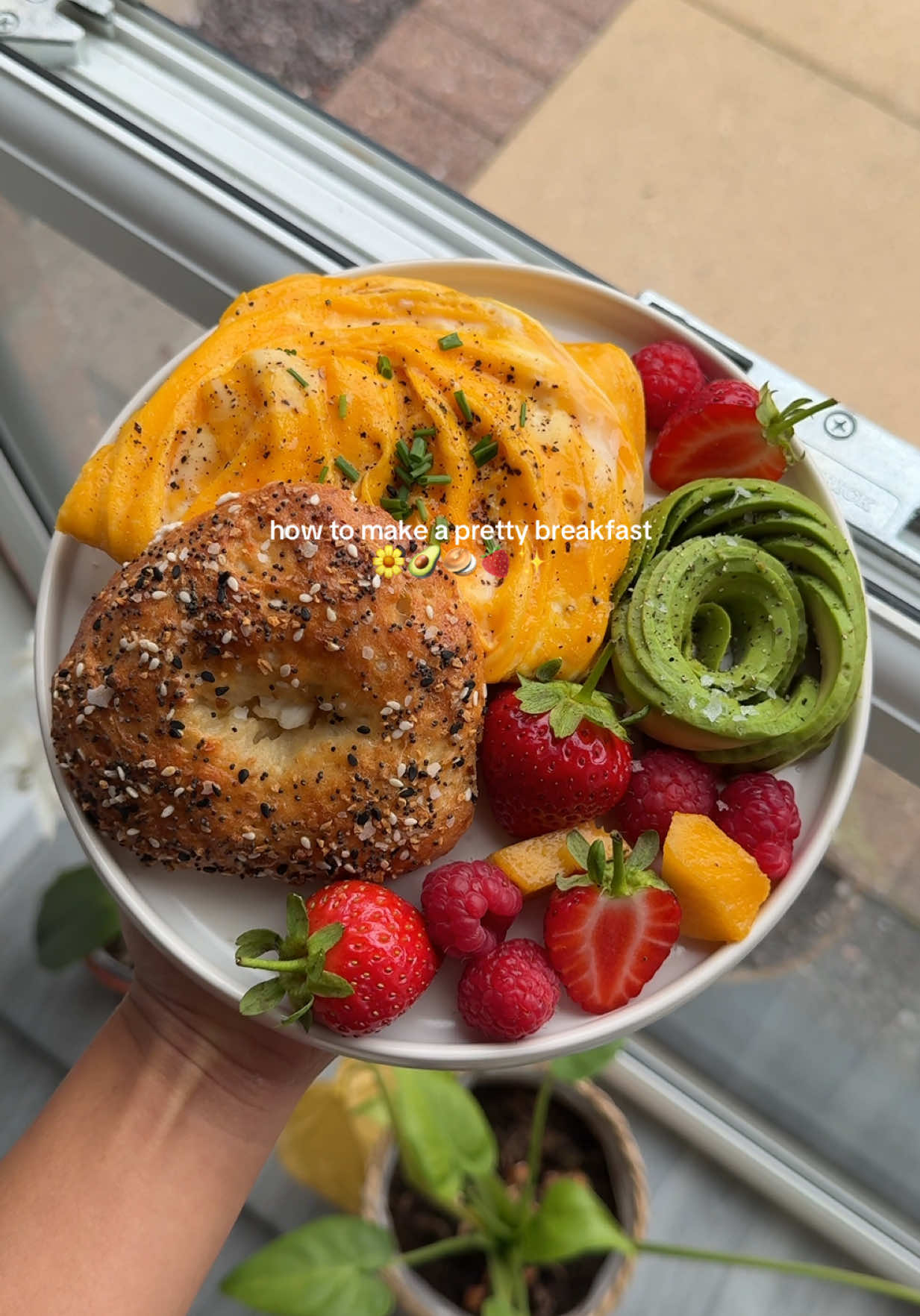 make a pretty breakfast with me 💛  | what you need: 1/2 avocado, 2 eggs, butter, bagel, salt & pepper, chives, strawberries, peaches and raspberries ~ enjoy 😋