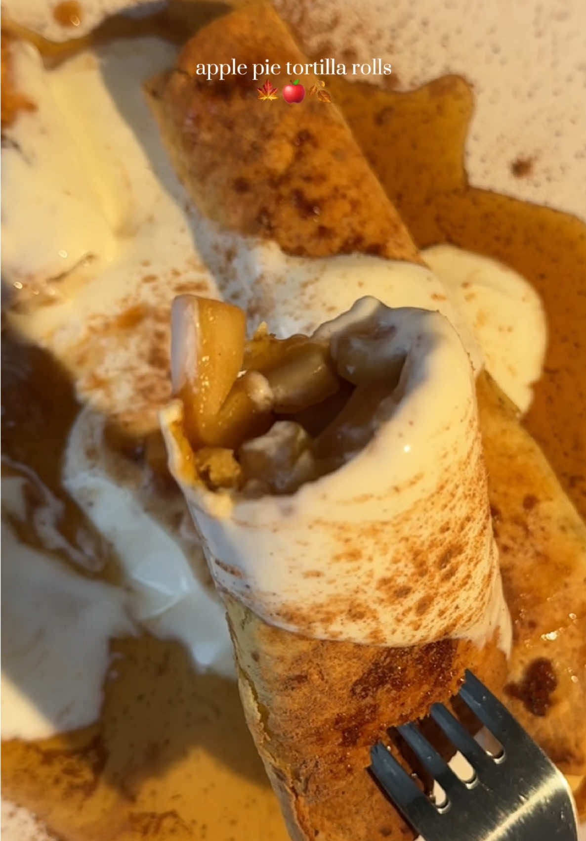apple pie tortilla rolls 🍎✨ ingredients: 1 apple, cubed maple syrup cinnamon 1 tsp cornstarch + water tortilla coconut oil spray greek yogurt (for topping) instructions: 1️⃣ chop apple + cook with maple syrup, cinnamon + cornstarch mix until soft 2️⃣ place filling in tortilla + roll 3️⃣ spray with coconut oil, sprinkle brown sugar (optional) 4️⃣ air fry 8 min @ 180°C (@Ninja UK Bake setting) 5️⃣ top with greek yogurt, maple syrup + cinnamon crispy outside, gooey apple center 🤤 save + try later! #airfryerrecipes #applepie #EasyRecipes #snackideas