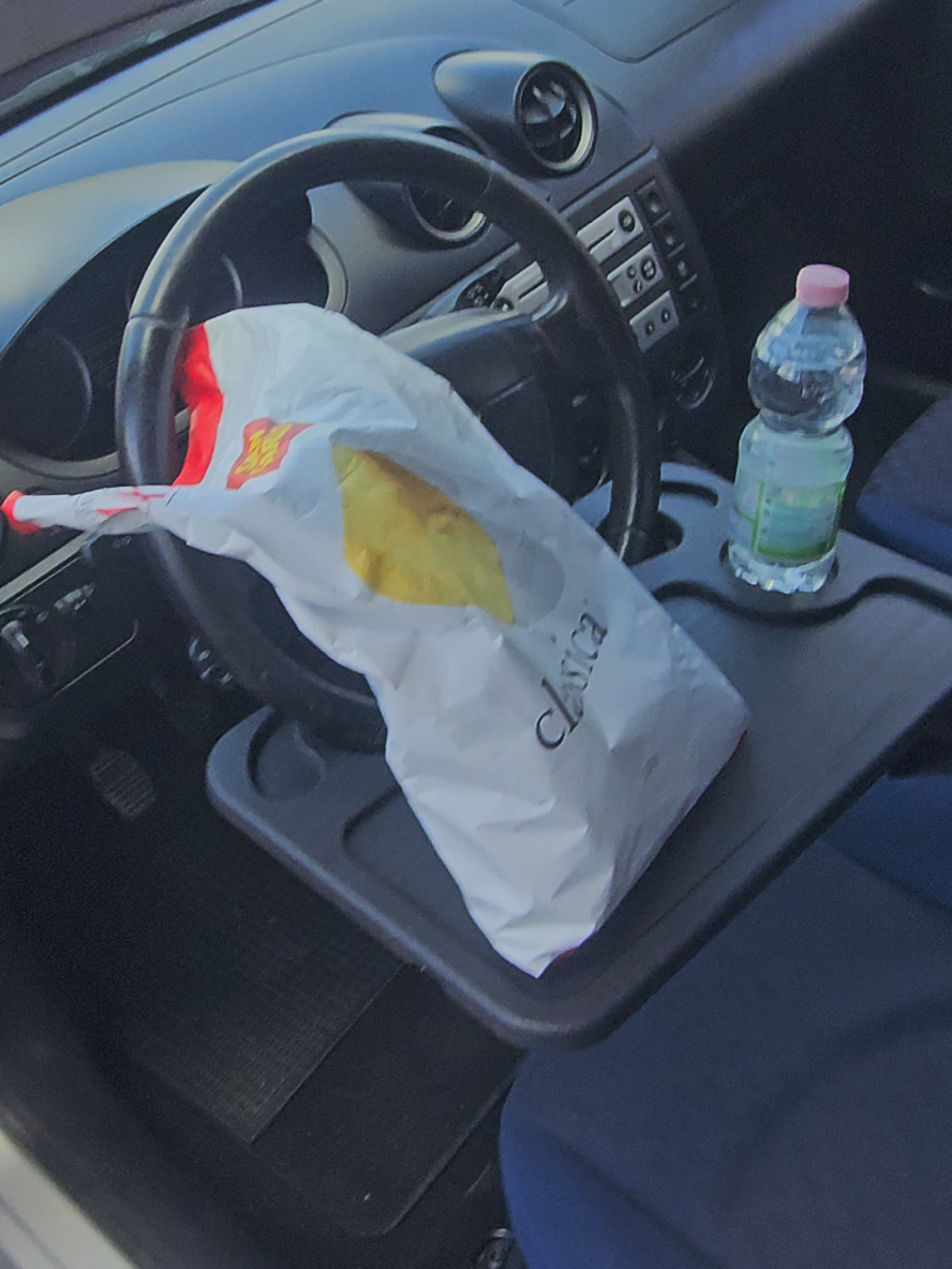 Car Steering Wheel Desk – Multifunctional Portable Tray for Eating & Laptop Convenient car steering wheel desk for working, eating, or studying comfortably inside your car. #CarGadgets #SteeringWheelDesk #CarAccessories #WorkFromCar #travelessentials 