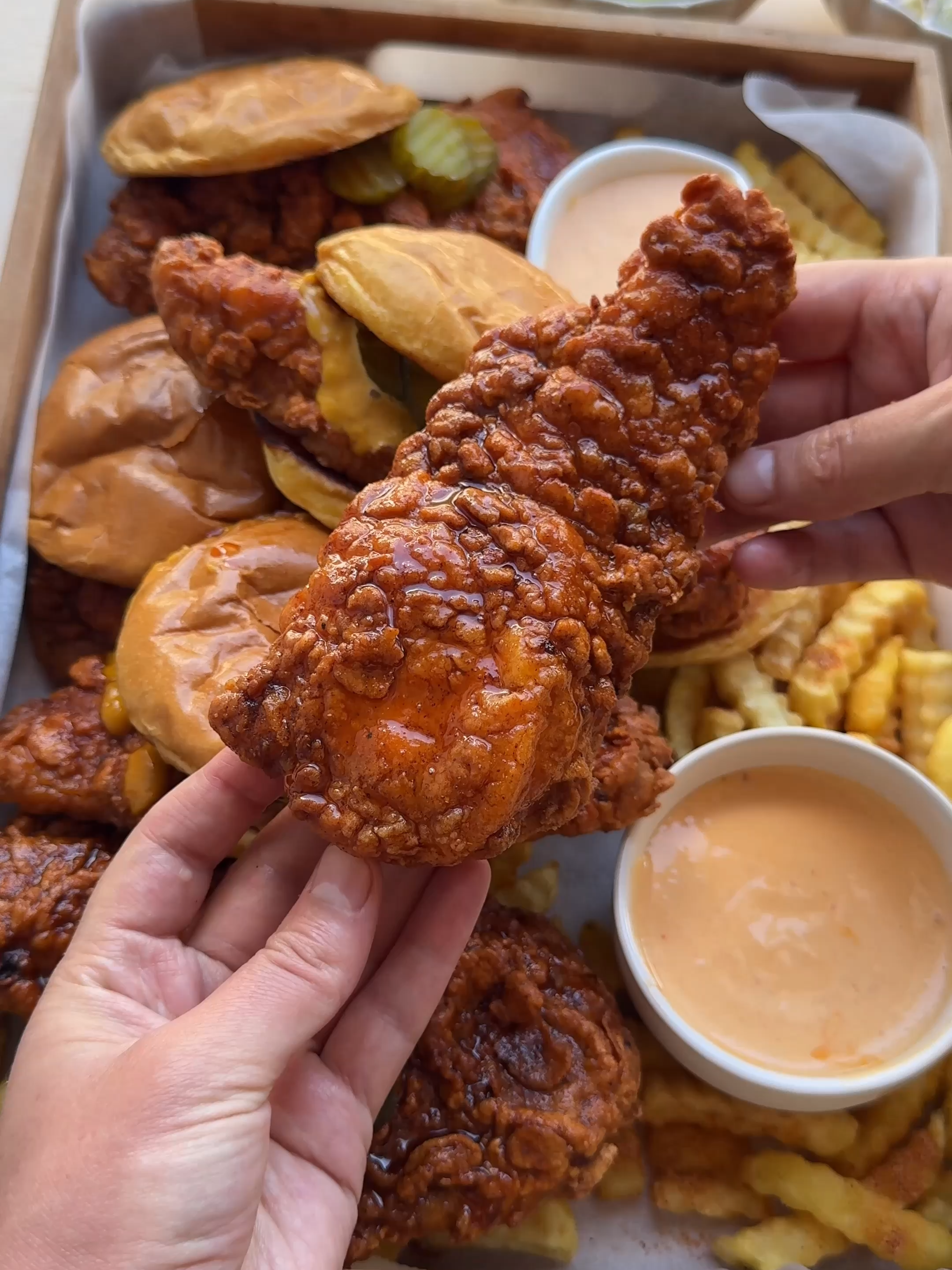 DAVE’S HOT CHICKEN RECIPE #food #recipe #chicken #daveshotchicken #spicy #hot #homemade #fy #fyp #foryoupage CHICKEN MIXTURE 700 g chicken breast 300 ml buttermilk 30 g sambal oelek 25 ml pickle juice 4 g onion powder (1⅓ teaspoon) 3 g cayenne pepper (1 teaspoon) 2 g black pepper (⅔ teaspoon) 3 g garlic powder (1 teaspoon) 3 g paprika (1 teaspoon) 8 g salt (1⅓ teaspoon) 1 egg (medium) FLOUR MIX 175 g cornstarch 125 g flour (all-purpose) 3 g cayenne pepper (1 teaspoon) 2 g paprika  (⅔ teaspoon) 3 g garlic powder (1 teaspoon) 4 g onion powder (1⅓ teaspoon) 3 g salt (½ teaspoon) HOT SAUCE 100 ml sunflower oil 3 g cayenne powder (1 teaspoon) 3 g onion powder (1 teaspoon) 2 g black pepper (⅔ teaspoon) 3 g paprika powder (1 teaspoon) SAUCE 125 g mayonnaise 30 g hot chili sauce 50 g hot sauce (see above and step 6) 30 ml pickle juice Instructions In a deep bowl, mix the buttermilk, sambal, pickle juice (25 ml), onion powder, cayenne pepper, black pepper, garlic powder, paprika, salt, and the beaten egg. Slice the chicken into thin pieces and add them to the mixture. Stir well, cover, and let the chicken marinate in the refrigerator for at least 30 minutes. In a large bowl, mix the cornstarch, flour, cayenne pepper, paprika, onion powder, garlic powder, and salt. Take the chicken pieces one by one out of the marinade, let them drain slightly, and coat them in the flour mix. Place the breaded chicken on a sheet of parchment paper. In a bowl, mix the sunflower oil, cayenne powder, onion powder, black pepper, and paprika. Set aside. In a small bowl, combine the mayonnaise, hot chili sauce, 50 g of the prepared hot sauce, and the pickle juice (30 ml) until smooth. Heat a generous layer of sunflower oil in a frying pan over medium heat. Fry the chicken pieces until golden brown and cooked through on both sides. Drain on paper towels. Brush the chicken with the hot sauce.