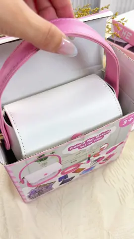 the cutest little purse with pretend makeup and toys!!! A perfect gift for little girls. #pretendplay #toypurse #pretendmakeup #toysforkids #toddlertoys #giftideasforkids 