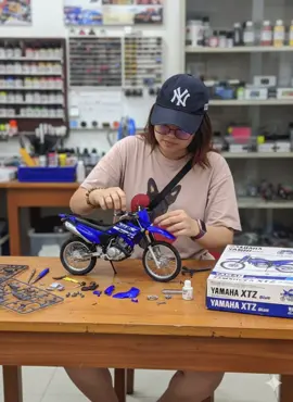 Tutorial step by step 🤗 Step 1: Search “Gemini AI” on google Step 2: Chosse a photo in your gallery that includes you and and your motorcycle. Step 3: “Paste this prompt” Make this motorcycle into a toy assembly model, with the person in the picture on the right sitting on the table assembling the motorcycle toy, the car is 1/4 size and the box of the motor is on the side, it says (model of your motorcycle) on the box, and there are are parts and tools nearby to make it more realistic. Step 4: Click “Submit” and wait till your generated photo is finished or complete. Step 5: Download the generated photo.  Thanks me later! You can do it also and it is very easy to do 😉 #Yamaha #XTZ #fyp #fy #aigenerated 
