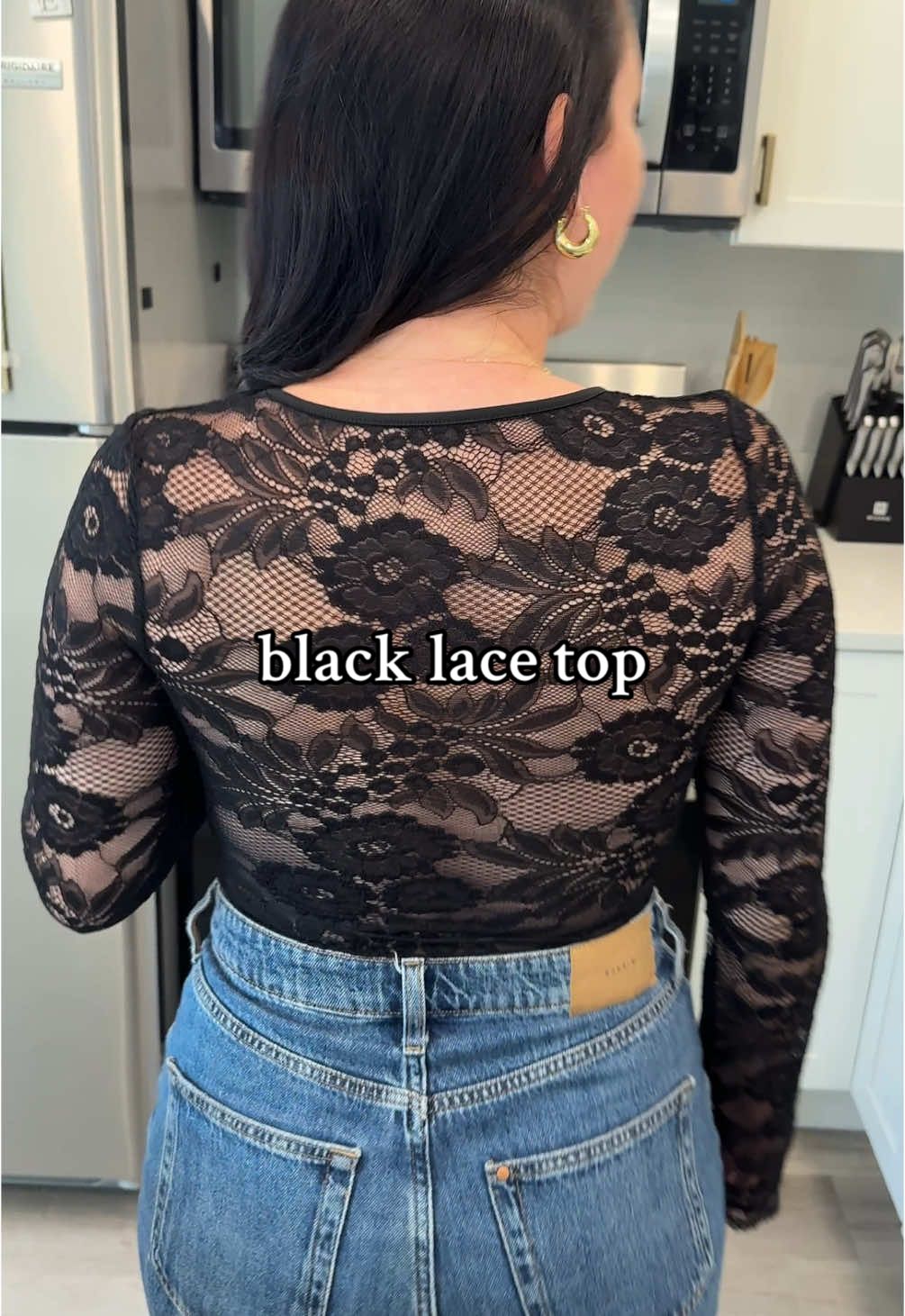 This black lace long sleeved top with an open back is perfect for date night ✨ #blacklace #datenight #datenightoutfit #flirty #nightout #nightoutoutfit #falldealsforyou #falloutfits #tiktokmademebuyit 