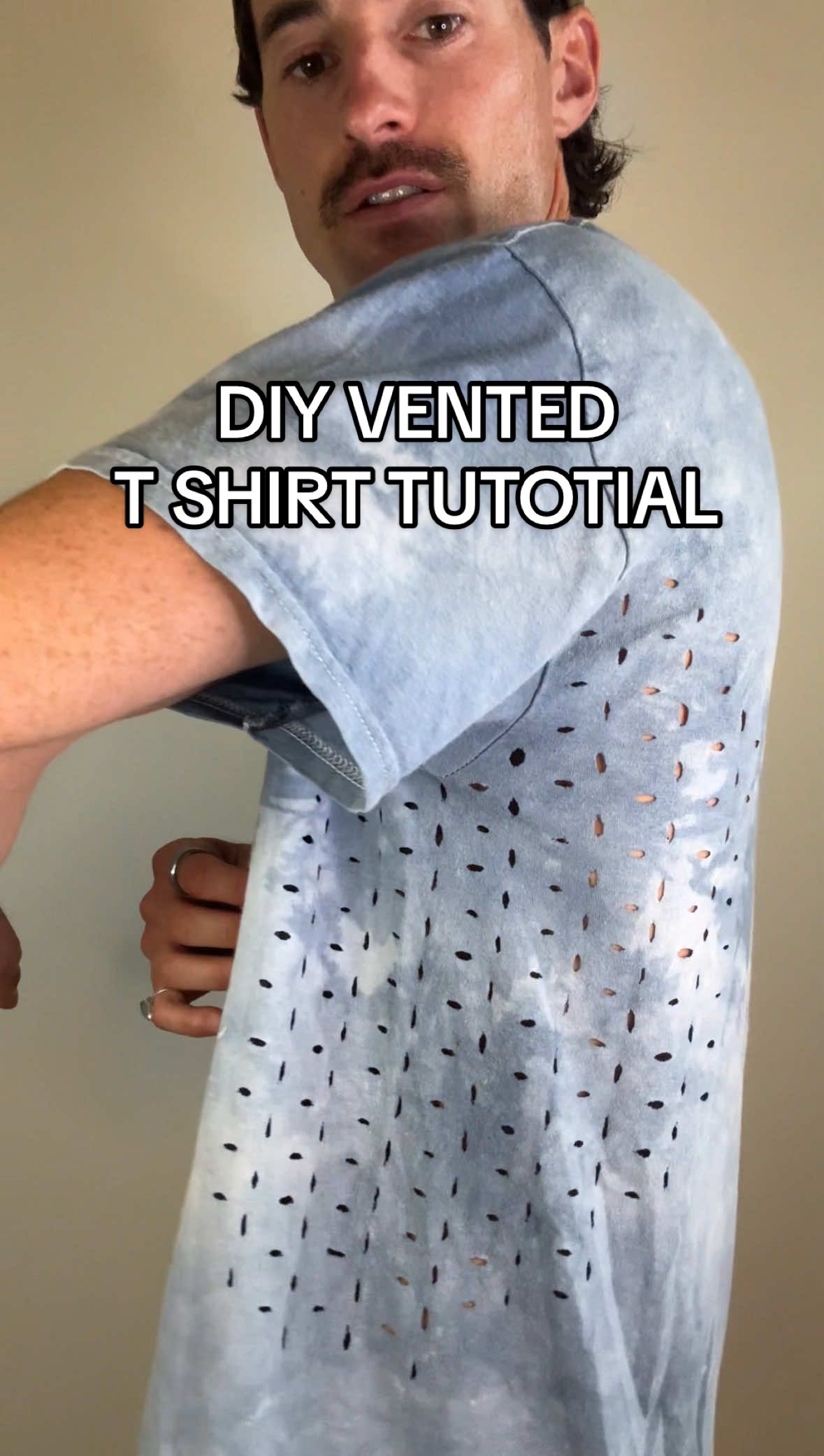A follow up video to show how I did this perforated T shirt technique for adding ventilation to a shirt. I took the original shirt on a 6 week trip and through multiple washes the holes have held up really well.  I thought it could be an issue over time, but if you think about when you get a hole in your shirt, it never really does fray the fabric or get worse over time unless it gets snagged on something There’s really a lot of different designs/patterns you could use to cut these perforations, and even with the placement of where the venting is taking place. Underarms are a point of heat dissipation and sweat so that’s where I focused, and because I wanted it to be a bit more subtle… Would you try this on a shirt? #DIY #diyproject #vented #tshirt #staycool #breeze #summertime #hothotheat #diyshirt #ventilation