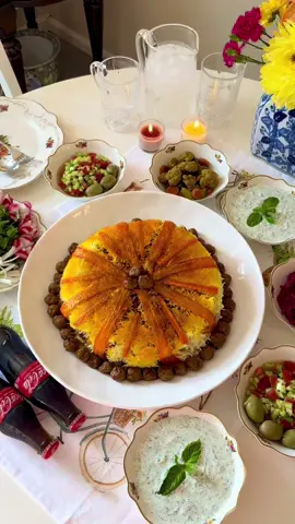 Havij Polo 😋 (Persian Carrot Rice with Meatballs) A fragrant Persian pilaf made with rice, carrots, and meatballs. This dish is loved across Iran, with different families adding their own twist. Ingredients (serves 3–4) Meatballs: * 1 lb ground beef * 1 large onion, grated * 1 teaspoon salt * 2 tablespoons bloomed saffron Carrot mixture: * 1 large onion, thinly sliced * 6 large carrots (about 2 per cup of rice), cut into matchsticks * 1 cup barberries * 2 tablespoons sugar * 3 tablespoons sliced pistachios * 3 tablespoons bloomed saffron * 1 tablespoon rosewater * 1 tablespoon cardamom water (or ¼ teaspoon ground cardamom) Rice and tahdig: * 3 cups basmati rice * 3 teaspoons salt * 1 large carrot, peeled into thin ribbons Instructions: Prepare the rice: 1. Rinse the rice 3–4 times until the water runs clear. 2. Soak in lukewarm water with 3 teaspoons salt for 1 hour. Carrot mixture: 1. Heat oil in a large pan and sauté the sliced onion until golden. Remove and set aside. 2. In the same pan, sauté the carrot matchsticks until tender. 3. Add the onions back in along with barberries, sugar, pistachios, saffron, rosewater, and cardamom water. Mix well and set aside. Meatballs: 1. Combine ground beef, grated onion, and salt. Mix well. 2. Shape into small bite-sized meatballs. 3. Fry in oil until cooked through. Add saffron, toss well, and set aside. Carrot tahdig: 1. Boil the carrot ribbons for 10–15 minutes until just tender. Drain. Parboil rice 1. Bring a large pot of water to a boil. 2. Add rice and cook for 6–8 minutes, until 80% done. Drain. Layer and steam: 1. In the same pot, add oil and line the bottom with parchment paper. 2. Arrange the carrot ribbons in a star shape for the tahdig. 3. Layer: one-third rice, one-third carrot mixture, and one-third meatballs. Sprinkle with a little saffron. 4. Repeat until all ingredients are used (reserve some meatballs for garnish if desired). 5. Cover and steam over low heat for 1 hour. Serve: Flip onto a platter so the carrot tahdig shows on top. Garnish with reserved meatballs and serve with Shirazi salad, sabzi khordan (fresh herbs), torshi (pickled vegetables), or yogurt. Noosh-e jaan 😋 #persiancuisine #persianfood #persianrecipes #havijpolo #riceandmeatballs