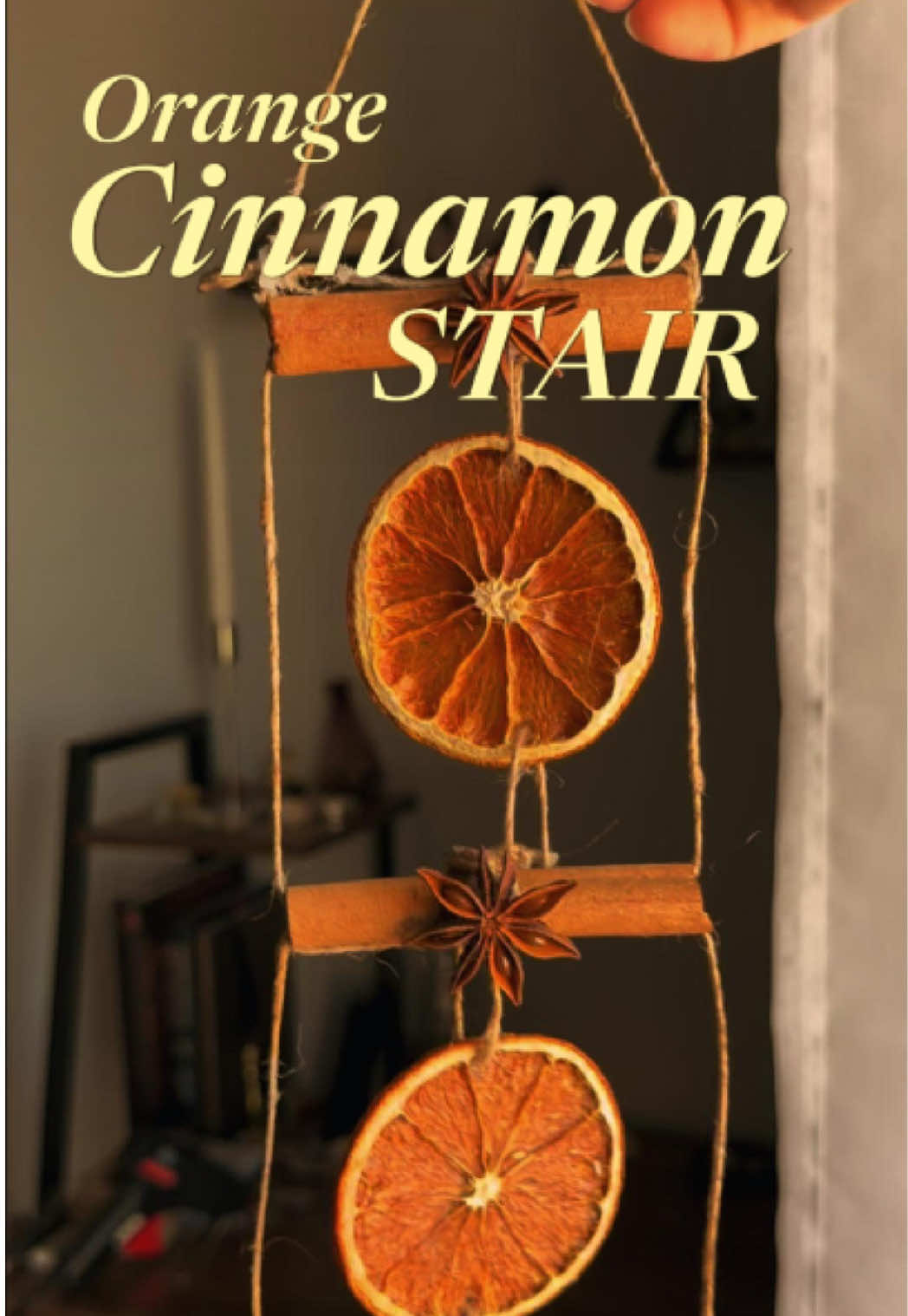 A cozy stair charm of oranges, cinnamon, and star anise — bringing joy, warmth, and a sprinkle of good fortune into the home ✨🍊🔥🌌 #witchtok #witchesoftiktok #autumncrafts #DIY #witchcraft 
