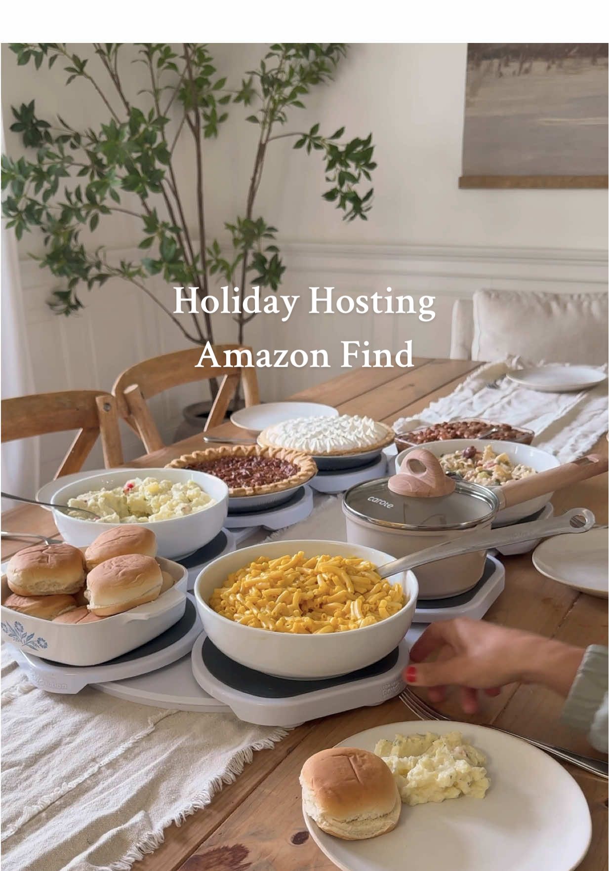 Amazon hosting find! Get ready for the holidays with this Lazy Susan rotating serving turn table! Rotate serving dishes around the table for easy access. Make holidays easier and more enjoyable with this rotating serving table! It sets up easily with no tools required. It can also expand to fit larger tables and you can buy additional serving trays!! #entertainingathome #amazonhome #hostingideas #amazonfinds #homehacks 
