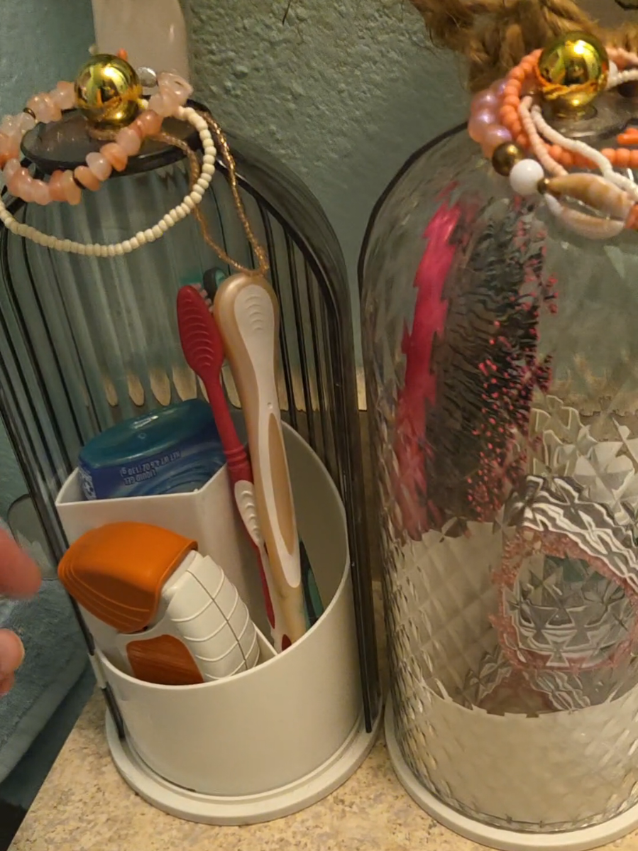 This rotating Toothbrush makeup brush holder is great for keeping your sink or vanity organized and clean.  #vanityorganization #bathroomorganization #toothbrushholder #vanitysetup #bathroomessentials 