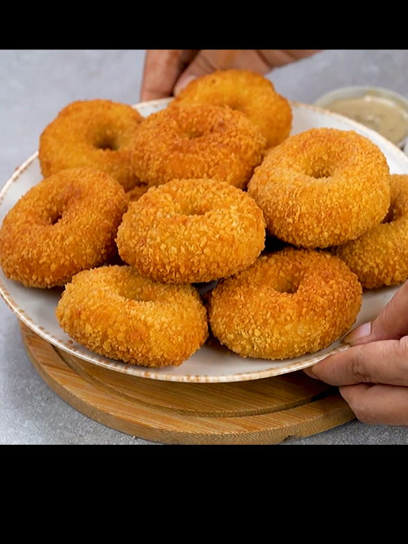 Chicken Donut | Make Once, Store for Weeks! | Crispy Chicken Donuts | Chicken Donuts for Tiffin Box . . . Ingredients & Process: 1 Cup Boiled Shredded Chicken  2 Boiled Mashed Potatoes 3 Tbsp Onion 1 Tsp Ginger Garlic 1 Tsp Green Chilli 1/2 Tsp Pepper Powder 1/2 Tsp Salt 1 /2 Tsp Chilli Powder 1/2 Tsp Cumin 1 Egg Mix Pour In Blender Blend The Mixture Pour In A Bowl 2 Tbsp Flour 2 Tbsp Breadcrumbs Mix Well Grease Oil In Hand Make In Doughnut Shape Beat 1 Egg Dip In Egg Mixture Coat With Breadcrumbs Fry In Medium Heated Oil Fry Until Golden Brown Color . . . . #foryoupage #fyp #viral #trending #chickendonuts     