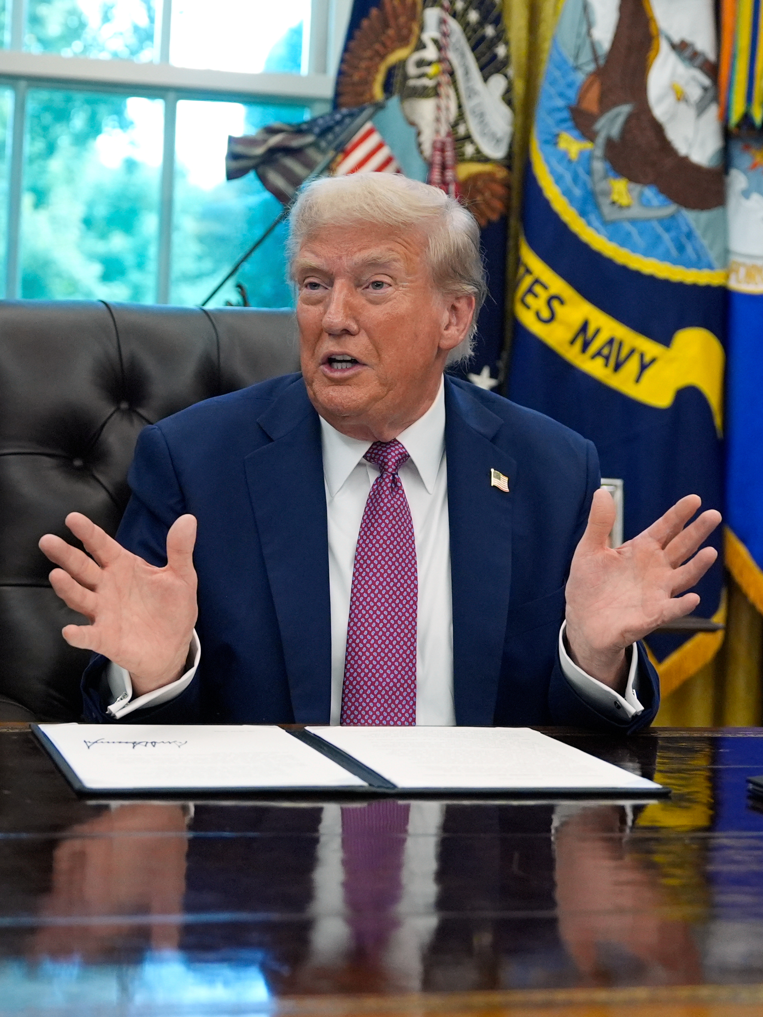 Trump warns Venezuelan jets will be 'shot down' if they threaten US forces