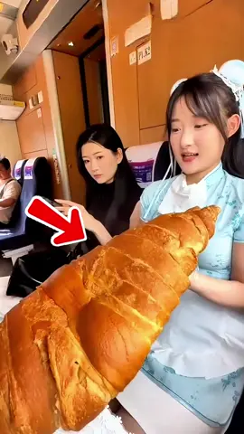 # She pulled out a HUGE Croissants on the train 😂🥐