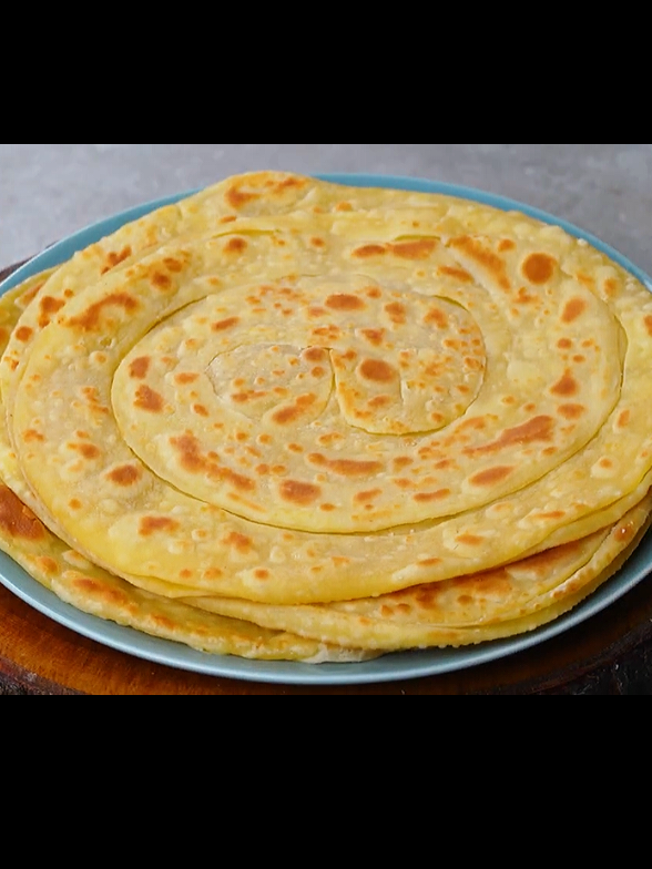 Laccha Paratha Recipe | Homemade Crispy & Delicious Laccha Paratha Recipe | Breakfast Snacks Recipe . .Ingredients & Process: 1 Cup Flour/Maida ½ Tsp Salt  1 Tbsp Oil Mix Well 1 Egg ¼ Cup Water  Make Dough Take Some Dough Roll 1 Tsp Ghee Sprinkle Flour  Fold As Shown  Roll Fry In Medium Heat Ghee Fry Both Sides Well . . . #foryoupage #fyp #viral #trending #lacchaparatha     