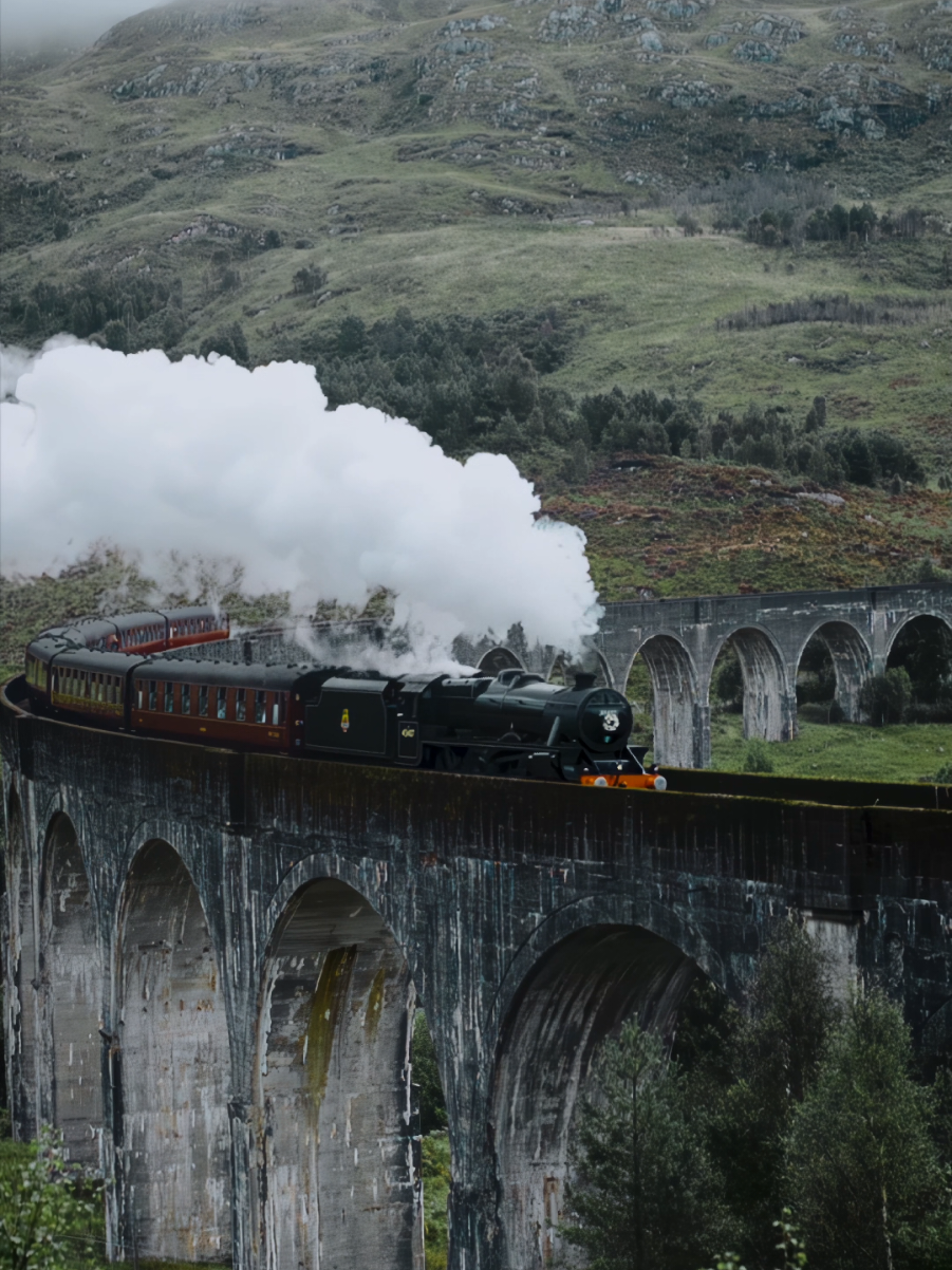 Real life Hogwarts Express!🦉✉️🪄⚡️📍Glenfinnan Viaduct, Scotland It's been a DREAM of mine to see the the Jacobite steam train and it was absolutely magical ✨️ Jacobite steam train is a steam locomotive tourist train in Scotland. Since 1984 it runs every day during summer from Fort William to Mallaig. It is a prototype of Hogwarts Express in Harry Potter movies. In the middle of its ride it crosses the Glenfinnan viaduct. This moment you can see in the second movie Harry Potter and Chamber of Secrets when Harry and Ron were trying to catch up the train on a blue car:) #harrypotterfan #potterheads #hogwarts #HarryPotter #harrypottertiktok  Harry Potter, Hogwarts Express train, Back to Hogwarts, Harry Potter world