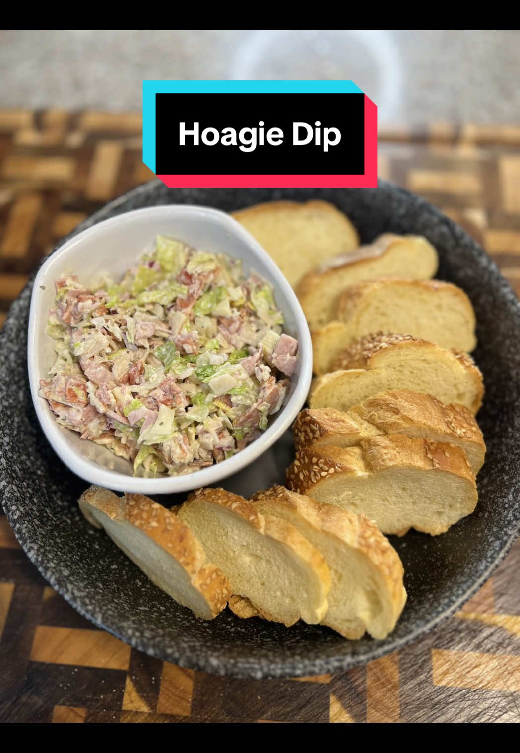Hoagie Dip! Ingredients: Turkey - 1/2lb Ham - 1/2lb Salami - 1/2lb Pepperoni - 1/2lb Provolone - 1/2lb Red Onion - 1/2 Shredded Lettuce - 3c Mayo - 1+ c Red Wine Vinegar - 2tbsp Italian Seasoning  Hot Cherry Pepper Hoagie Spread - 2tbsp Italian Bread Directions: 1. This is one of the easiest dips you’ll ever make for an event! All you have to do is chop everything up, mix and you’re set!  2. I used a half pound of all the deli meats and the cheese. But the best thing about this recipe is that it’s fully customizable! My usual is turkey, ham, salami, pepperoni and provolone cheese. I cut up a head of iceberg lettuce but you can always just buy the pre shredded.  3. Combine everything to a large bowl and then add in your mayo. I did a little over one cup but, again, you can add as little or as much as you want. Then 2tbsp tablespoons of red wine vinegar, some Italian seasoning and then my secret weapon is the hot cherry pepper spread.  4. Serve it with chips or I prefer some nice Italian bread. Enjoy and GO BIRDS! #gobirds #hoagiedip #gamedayfood #nfl #eagles 