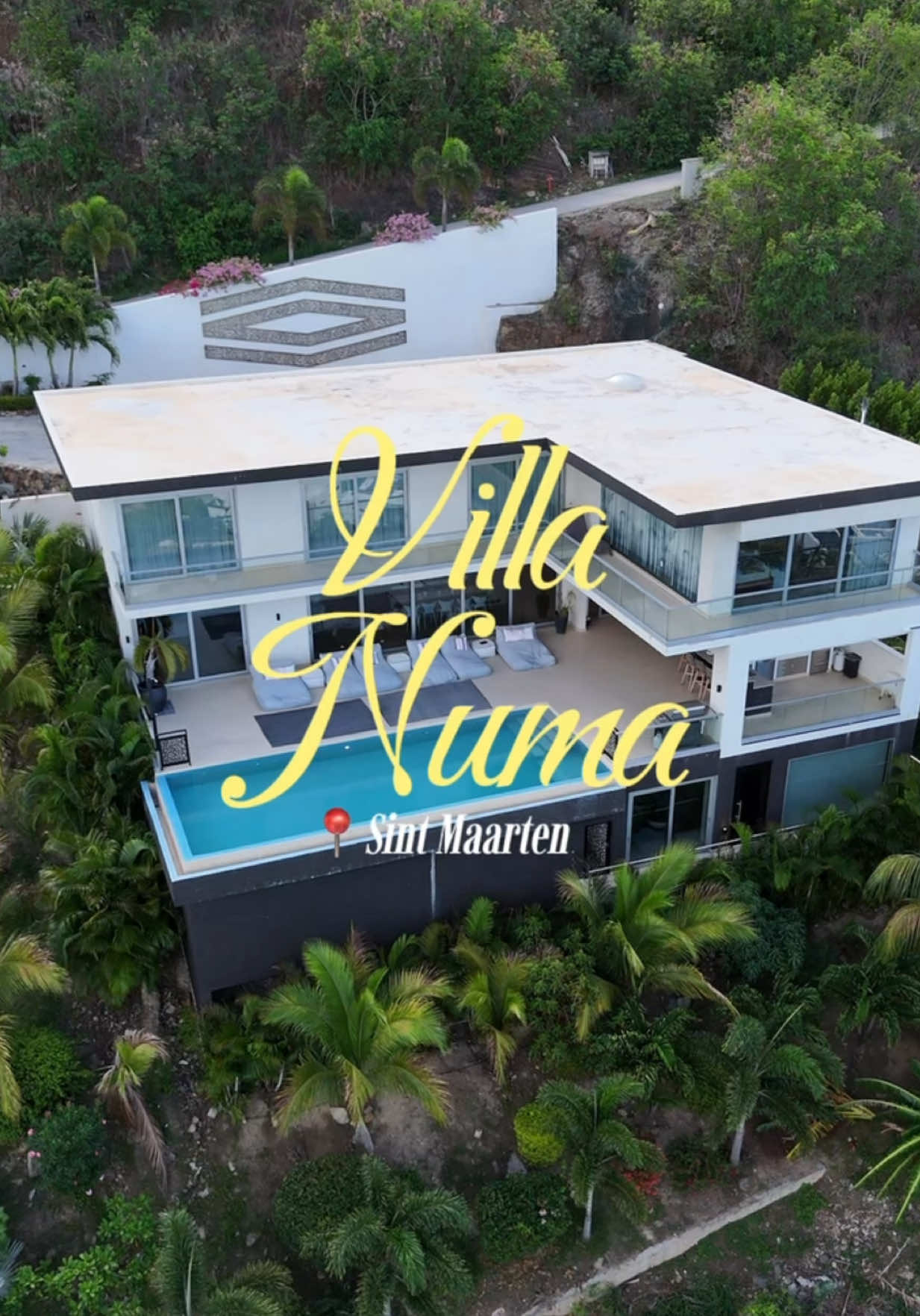 Arguably the most breathtaking airbnb in Sint Maarten🇸🇽 Would y’all stay here?  📍 Villa Numa  . . .  stunning views, 6 bedrooms, 6 baths, infinity pool, 2 kitchens, maid service, free roundtrip airport pickup. Definitely a must to book for your trip (dm for the link/ details)  #vacation #sintmaarten #saintmartin #airbnbvilla #traveltiktok #blackgirlluxury #airbnb #villatour #sxm #girlstrip #fyp 