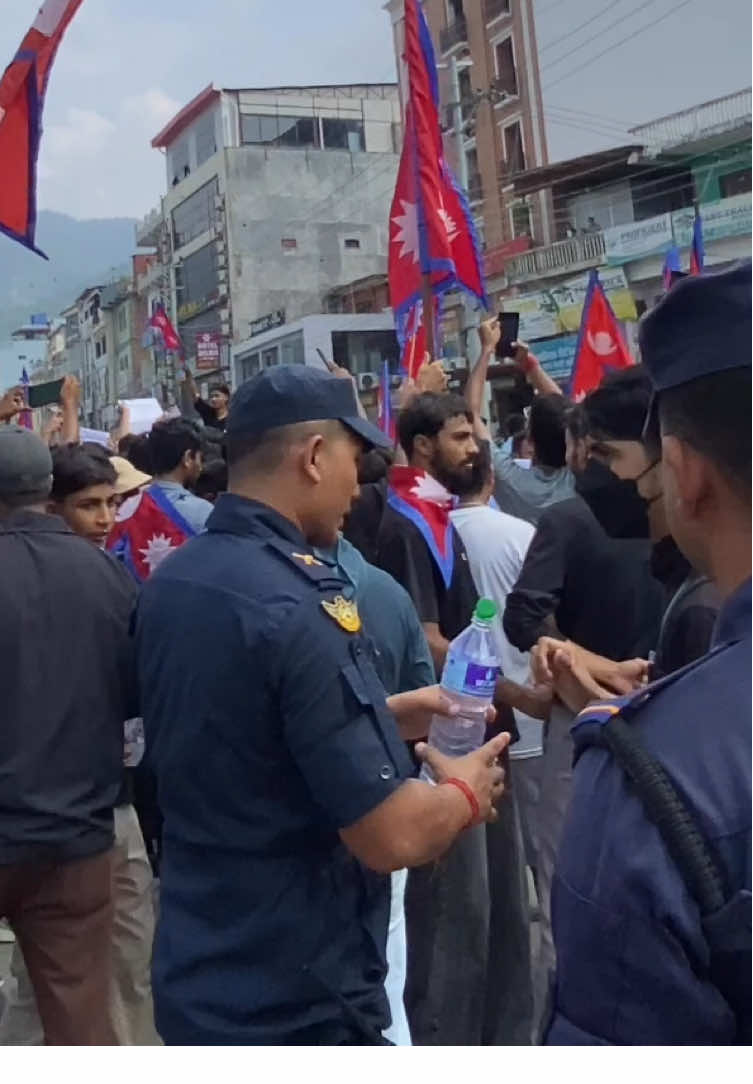 Thank you so much nepal police for take care of us  @🎶: @🎶:@🎶:@🎶Attack on a uniformed student is a grave violation of human rights and international laws. We call for an immediate, independent investigation and urge international human rights organizations and the UN to hold the government accountable. Justice must be served, and the voices of students must be protected, not silenced. Please tag international media. #JusticeForStudents  .please copy and Paste it in many videos Look how he give water GenZ#nepokids #genzprotest #nepal #butwalprotest 