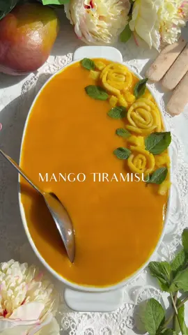 MANGO TIRAMISU🥭🍰💛 Welcome to Episode 6 of my Tiramisu Series! Today, I’m sharing this tropical Mango Tiramisu (aka Mangomisu) which is a fruity spin on the classic Italian dessert. It’s egg-free, made with mango pulp in the creamy filling, and instead of coffee, the ladyfingers are dipped in sweet mango goodness. Perfect for special celebrations or when you’re craving something refreshing and indulgent. Ingredients - 3/4 cup of mango pulp - 16 oz or 450g of mascarpone cheese  - ¾ cup of granulated sugar - 1 teaspoon of vanilla extract - 1 ½ cups of heavy cream or double cream - 260 g of Ladyfingers or enough to fill the dish Topping - ⅔ cup of mango pulp - Sliced mangoes - Mint leaves #mangotiramisu #mangodessert #nobakedessert #uniquedessert #tiramisu 