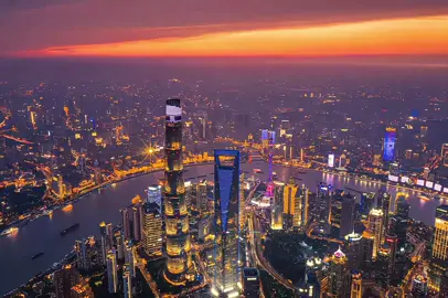 Shanghai's golden moment.🌆Sunset paints the Huangpu River, connecting the historic Bund to Pudong's glittering skyline. #Shanghai #Travel #sunset#traveltips #HuangpuRiver 