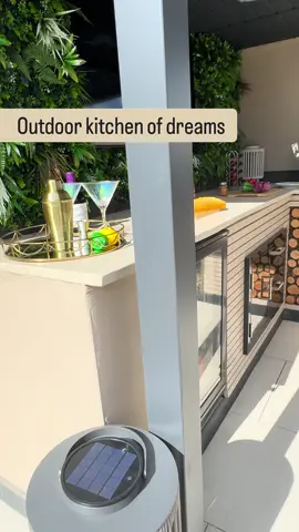 It might be September, but our outdoor kitchen is still in full swing ✨🍴🔥 We’re loving every moment cooking and entertaining under the pergola with our Draco BBQ, sleek stainless steel black cupboards, and built-in outdoor fridge – all from @Garden Trends 🌿🍷 This space has completely transformed how we dine and host at home, bringing restaurant-style vibes straight to the garden. Who says al fresco season has to end? 🌙✨  #OutdoorKitchen #DracoBBQ #GardenTrends #AlFrescoDining #BBQSeason       