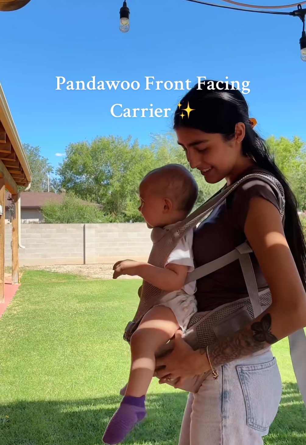 Replying to @Camille | Girl Mom 💜  I love that this holds my phone, keys , wallet anddd her pacifier. My nosey daughter can finally see what i’m doing without trying to break her neck in the front facing carrier 😂 you can also take the straps off for just a hip carrier! #pandawoocarrier #babycarrier #frontfacingcarrier #firsttimemom #babymusthaves  
