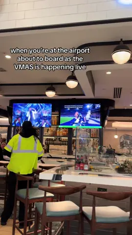 couldn’t watch the vmas live cuz I was on the plane AS it was happening but the airport was playing it! I watched a second of ricky martin performing livin la vida loca #vmas #mtv #vmas2025 #airport #fyp   