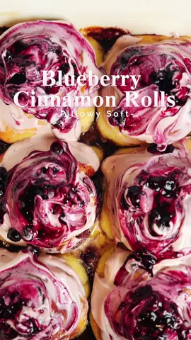 Blueberry Cinnamon Rolls 🫐 These blueberry cinnamon rolls are a little twist on the classic. They’re fluffy, gooey, and topped with a creamy glaze that melts right in. Perfect for breakfast, brunch, or whenever you’re craving something cozy and sweet. Ingredients Dough * 180g (¾ cup) warm milk * 7g (2½ tsp) instant yeast * 50g (¼ cup) sugar * 57g (¼ cup) soft butter * ½ tsp salt * 360g (3 cups) Bread flour or All purpose flour 🫐 Blueberry Compote * 350g Blueberries (fresh or frozen) * 60g Brown or white sugar * 2 tsp cornstarch (dissolved in 2 tbsp lemon juice) * 1 Tbsp grated lemon zest  * → Cook everything in a pot on low heat until thick and jammy. Let it cool. Cinnamon Filling * 100g (½ cup) soft butter * 100g (½ cup) brown sugar * 1 Tbsp Ground Cinnamon Cream Cheese Frosting * 170g cream cheese (softened ) * 100g soft butter (softened ) * 100g powdered sugar * 1 tsp vanilla * 1 tsp Blueberry Compote  Method Step 1 – Activate the yeast * In a small bowl, mix warm milk , yeast and sugar stir, and let sit 10 minutes until frothy. Step 2 – Make the dough * In a large bowl, whisk together flour and salt. * Add the yeast mixture, mix it with a whisk or fork. And add butter Knead the dough for 5-7 minutes. You can use a mixer with dough hook attachment or knead by hand, until smooth and elastic.  * Place in a greased bowl, cover, and let rise 45 minutes - 1 hour or until doubled in size. Step 3 – Cinnamon filling * Mix softened butter, brown sugar, cinnamon, and a little vanilla until smooth. Step 4 – Shape the rolls * Roll dough out on a floured surface  * Spread cinnamon filling evenly over the rolled dough. * Spread the blueberry compote evenly  * Cut into even pieces . * Then roll each strip up into a spiral. (6-8 pieces ) (You can also roll the dough into a log and slice into pieces — either way works.) * Place in a greased 9x13” pan. * Cover and let proof another 30- 40minutes, until puffy. Step 5 – Bake * Preheat oven to 374°F (190°C). * Pour heavy cream (60ml) over the rolls before baking. * Bake for 20-25 minutes, until golden brown and cooked through ✨ Finish & Enjoy * Beat cream cheese and softened butter until smooth and fluffy. * Add powdered sugar and vanilla, mixing until creamy. * Spread the frosting generously over the warm rolls. * Swirl blueberry compote on top for extra flavour. * Serve, and enjoy — voilà! 🫐💙 #blueberrycinnamonrolls #blueberry #cinnamonrolls #freshlybaked #fyp @KitchenAid Australia & NZ 
