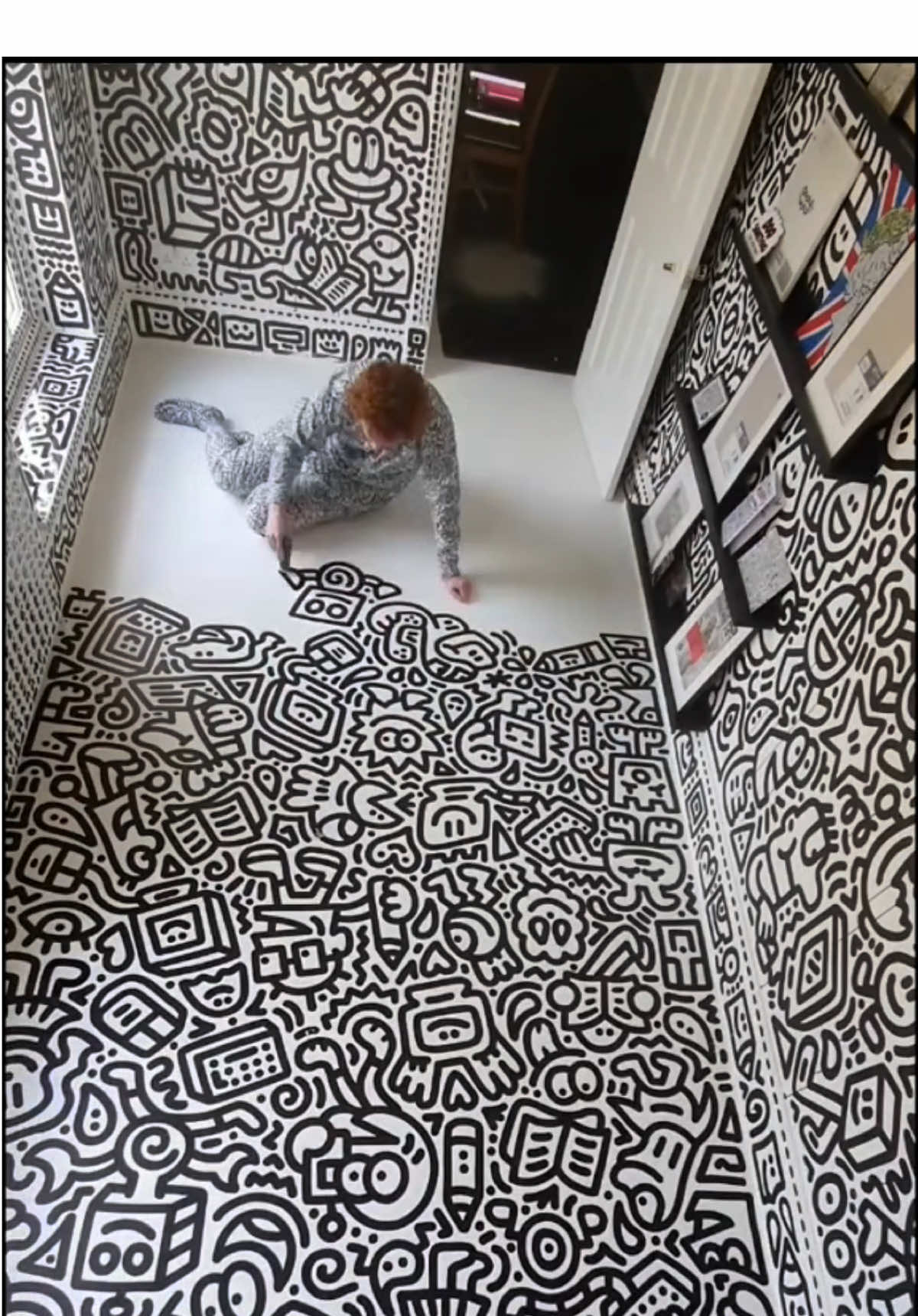 Sam Cox (@Mr Doodle) is an English illustrator and mural artist celebrated for his “graffiti spaghetti” style—dense, monochromatic doodles that snake across walls, objects, clothing, and entire spaces. His signature compositions teem with imaginary characters and symbols drawn in thick black lines on white backgrounds. From an early age, he doodled obsessively—covering his schoolbooks, bedroom walls, and furniture—developing an immersive visual language he dubs “DoodleLand”. His first major solo exhibition, “Attention Seeker” (2016), transformed London’s Hoxton Gallery into a continuous doodled environment—walls, floor, columns, even dining furniture .  In 2022, he undertook his most ambitious project yet: covering every surface of his six-bedroom house in Kent in doodles—over two years using 900 litres of paint, 401 spray cans, and thousands of pen nibs. #art #painting #artist #doodle #drawing