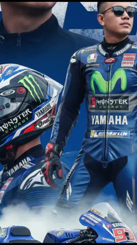 #Gemini Prompt Create a cinamatic MotoGP poster featuring [see image]. Keep the face, hair, shape, and angles of the original exactly as shown. Show the person in three perspectives: a close-up portrait without a helmet, a side view wearing a MotoGP-style racing helmet, and a full-body shot wearing a MotoGP racing suit with sponsor logos. At the bottom, place a Yamaha MotoGP Racing Bike doing a burnout with smoke around the tires. The bike should be display the racing number '99' clearly on the nose and sides. Use a bold Blue background with a large racing number '99' behind the character. The overall style should be ultra-realistic, high-resolution, cinematic, and have the feel of a professional sports poster. 