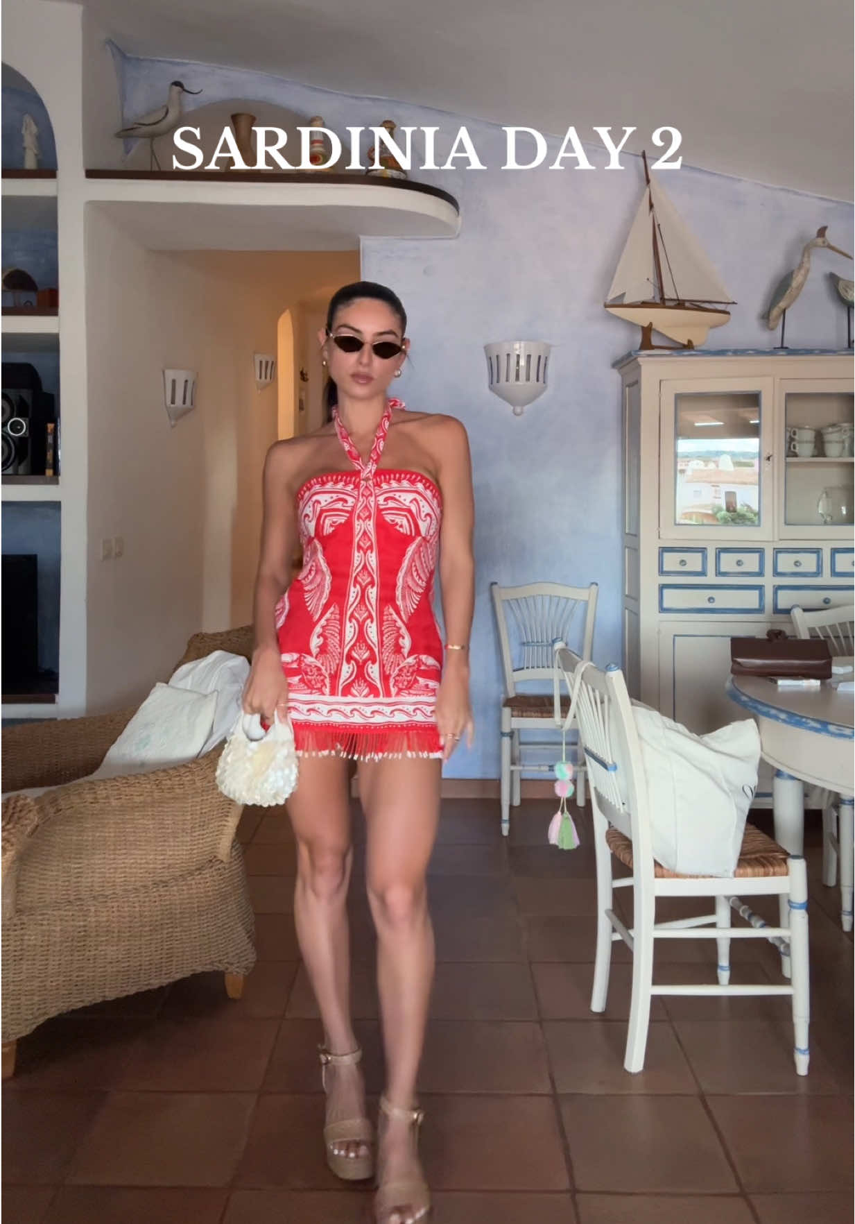 Sardinia outfit day 2  Dress: @FARM Rio  Glasses: @Miu Miu  Purse: @Lulus  Shoes: Larroude    #sardinia #sardegna #italy #OOTD #outfitinspo 